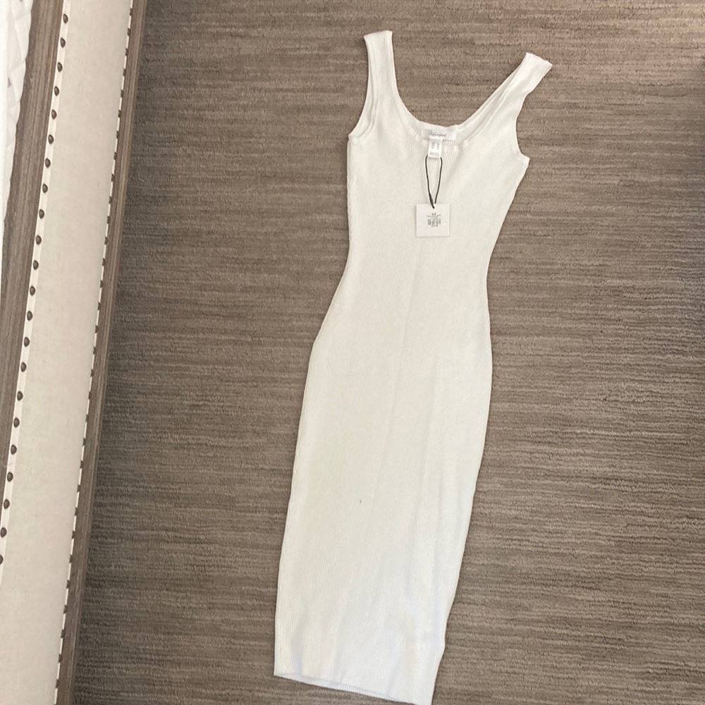 White dress medium tags on